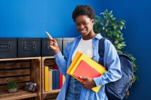 Aptitude Test candidate holding books