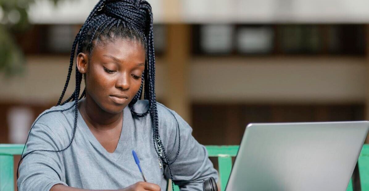 2025 Nigerian Immigration Exam candidate writing